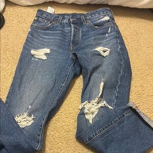 Relaxed Fit Distressed Denim Jeans